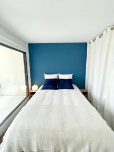 Posteľ alebo postele v izbe v ubytovaní T3 Neuf Archi Cocooning Terrasse Face à la mer