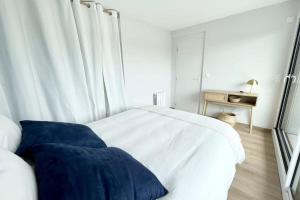 Posteľ alebo postele v izbe v ubytovaní T3 Neuf Archi Cocooning Terrasse Face à la mer