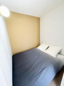 Posteľ alebo postele v izbe v ubytovaní T3 Neuf Archi Cocooning Terrasse Face à la mer