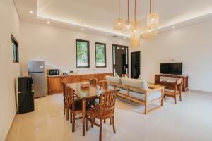 TV a/nebo společenská místnost v ubytování Alam Penari Resort Ubud