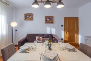 Posezení v ubytování DolomiApartments - Casa Ornella