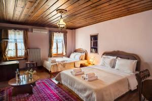 A bed or beds in a room at En Chora Vezitsa