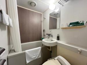 Koupelna v ubytování Hotel Route-Inn Jouetsu