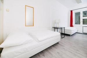 Benedikt City Center Hostel客房内的一张或多张床位