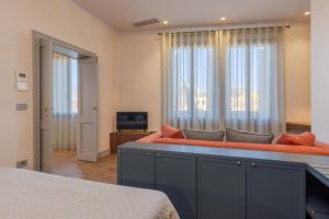 TV a/nebo společenská místnost v ubytování Ca' Mian Design Apartment