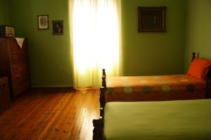 Postel nebo postele na pokoji v ubytování Kyra Vintage House