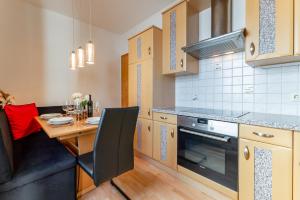Η κουζίνα ή μικρή κουζίνα στο Apartment Piesendorf XL