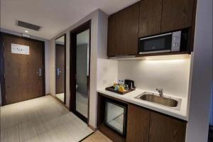 Panorama Beach Pearl Nha Trang Residences的厨房或小厨房