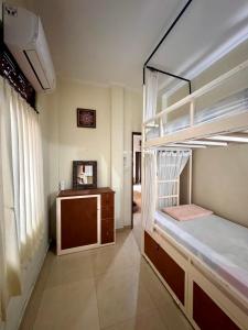 Ένα ή περισσότερα κρεβάτια σε δωμάτιο στο Nua House