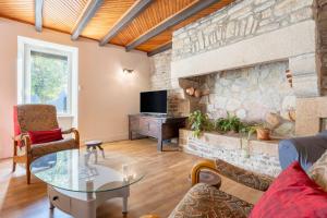 Μια τηλεόραση ή/και κέντρο ψυχαγωγίας στο Gîte Les Hirondelles