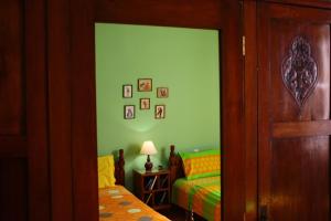 Postel nebo postele na pokoji v ubytování Kyra Vintage House