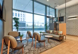 TV a/nebo společenská místnost v ubytování B&B HOTEL Dijon Valmy Toison d'or