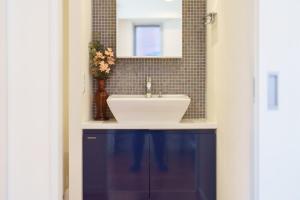 a bathroom with a sink and a mirror at Space Roppongi in Tokyo +83 photos