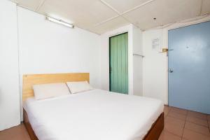 Postel nebo postele na pokoji v ubytování SPOT ON 89916 Gold Star Hotel