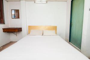 Postel nebo postele na pokoji v ubytování SPOT ON 89916 Gold Star Hotel