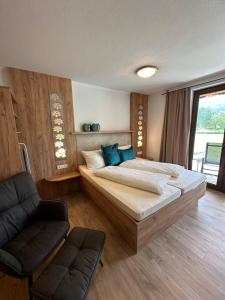 Postel nebo postele na pokoji v ubytování Apartment Haus am See