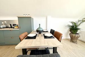 Kuchyň nebo kuchyňský kout v ubytování T2 Neuf Top Cocooning Terrasse - Face à la mer