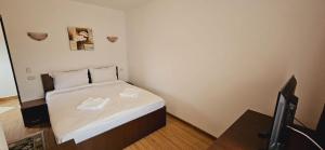 Postel nebo postele na pokoji v ubytování Hotel Bran Stoker