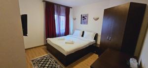 Postel nebo postele na pokoji v ubytování Hotel Bran Stoker