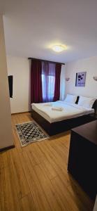Postel nebo postele na pokoji v ubytování Hotel Bran Stoker