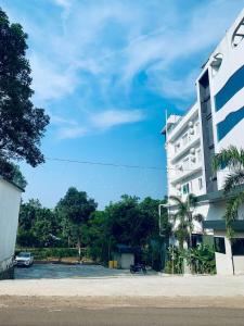 a building on the side of a road at Aurora Hotels and Resorts in Pulickamaly
