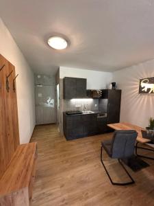 Kuchyň nebo kuchyňský kout v ubytování Apartment Haus am See