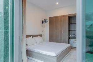 Letto o letti in una camera di Red Coral Hotel