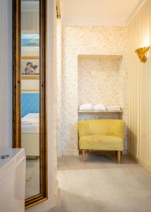Postel nebo postele na pokoji v ubytování Hotel Urania