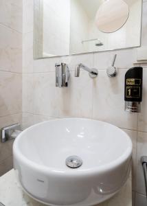 Koupelna v ubytování Hotel Urania