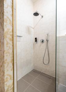 Koupelna v ubytování Hotel Urania
