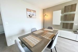 Kuchyň nebo kuchyňský kout v ubytování Royal Appartement de standing - Face à l'océan + 14 fotografií