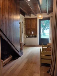 a living room with a couch and a fireplace at L'ENVOLEE in Champdeniers