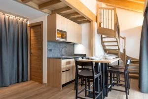 A kitchen or kitchenette at Residence Nevegall