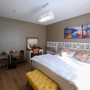 Postel nebo postele na pokoji v ubytování Adana City Boutique Hotel