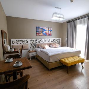 Postel nebo postele na pokoji v ubytování Adana City Boutique Hotel