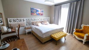 Postel nebo postele na pokoji v ubytování Adana City Boutique Hotel