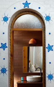 Koupelna v ubytování Dolty Kato Nubian House By Kato Dool + 37 fotografií