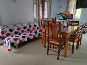 Katil atau katil-katil dalam bilik di Henz and Sia Guesthouse