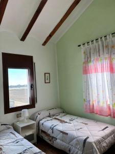 Postel nebo postele na pokoji v ubytování Casa Rue