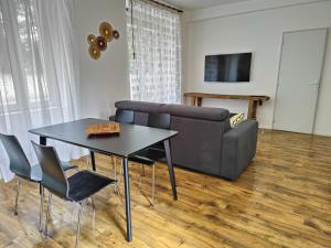 Μια τηλεόραση ή/και κέντρο ψυχαγωγίας στο L'appartement du parc
