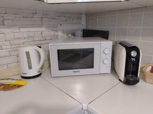 Kuchyň nebo kuchyňský kout v ubytování La Terrazza su Monza Casa Vacanze