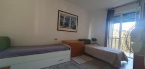 Letto o letti in una camera di CASA VACANZE Matilde