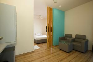 Postel nebo postele na pokoji v ubytování Lazo Avarta Resort and Convention Centre Pondicherry