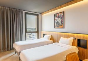 Postel nebo postele na pokoji v ubytování B&B HOTEL Clermont-Ferrand A71-A75 La Méridienne + 37 fotografií