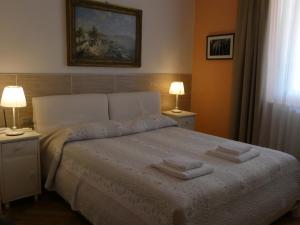 Кровать или кровати в номере Villa Varenna
