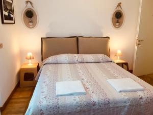 Кровать или кровати в номере Villa Varenna