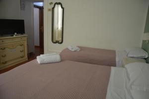 Posteľ alebo postele v izbe v ubytovaní Hotel Cordova