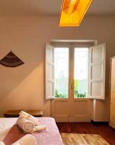 Postel nebo postele na pokoji v ubytování Casa del Mare e Relax - close to the Airport + 26 fotografií