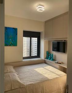 Ένα ή περισσότερα κρεβάτια σε δωμάτιο στο Apartamento 2 quartos aconchegante em frente ao Allianz Parque