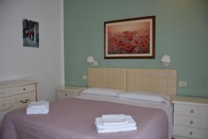 Posteľ alebo postele v izbe v ubytovaní Hotel Cordova